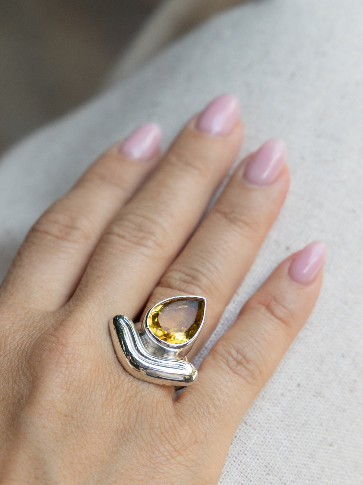 Lengua Drop Ring in sterling silver with citrine, on hand — handmade in Taxco, Mexico