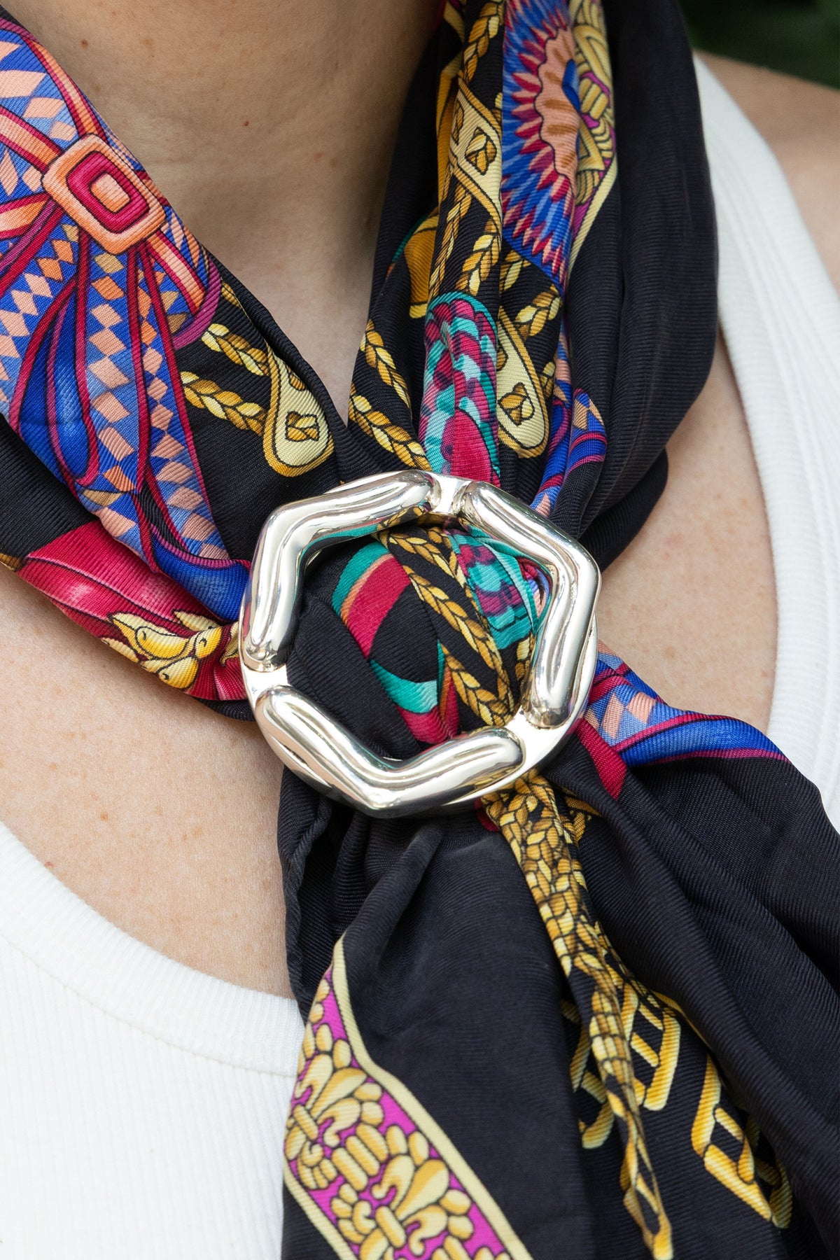 Lengua Scarf Ring in sterling silver, on model — handmade in Taxco, Mexico