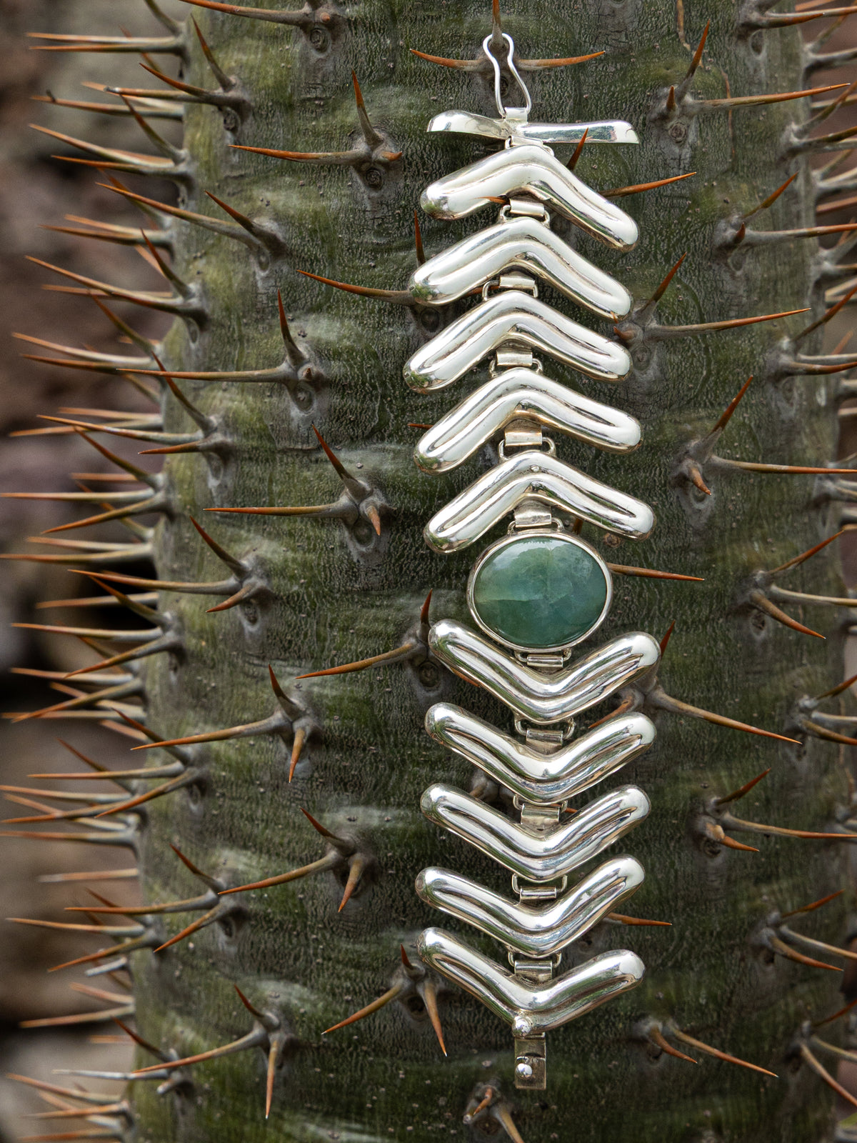 Lengua Center Stone Bracelet in sterling silver with jade, styled — handmade in Taxco, Mexico #Gemstone Type_Jade
