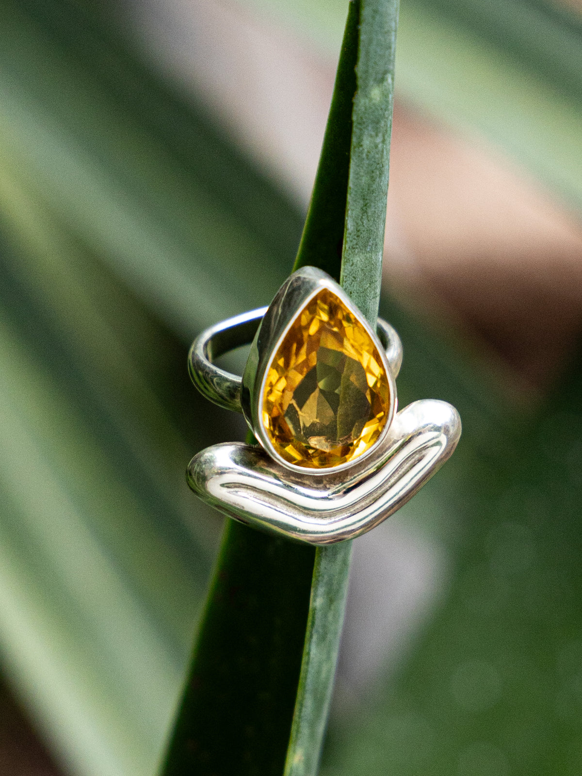 Lengua Drop Ring in sterling silver with faceted citrine, styled — handmade in Taxco, Mexico