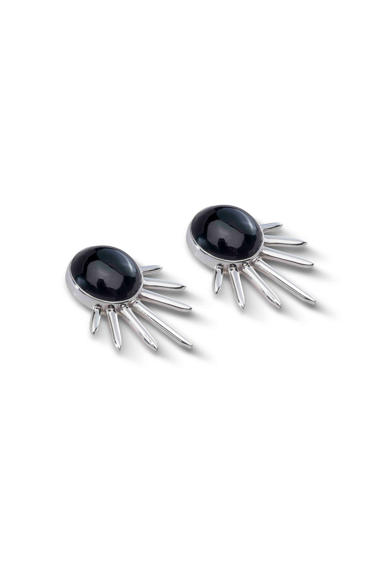 Sol Earrings in sterling silver with black onyx, lying flat — handmade in Taxco, Mexico #Gemstone Type_Onyx
