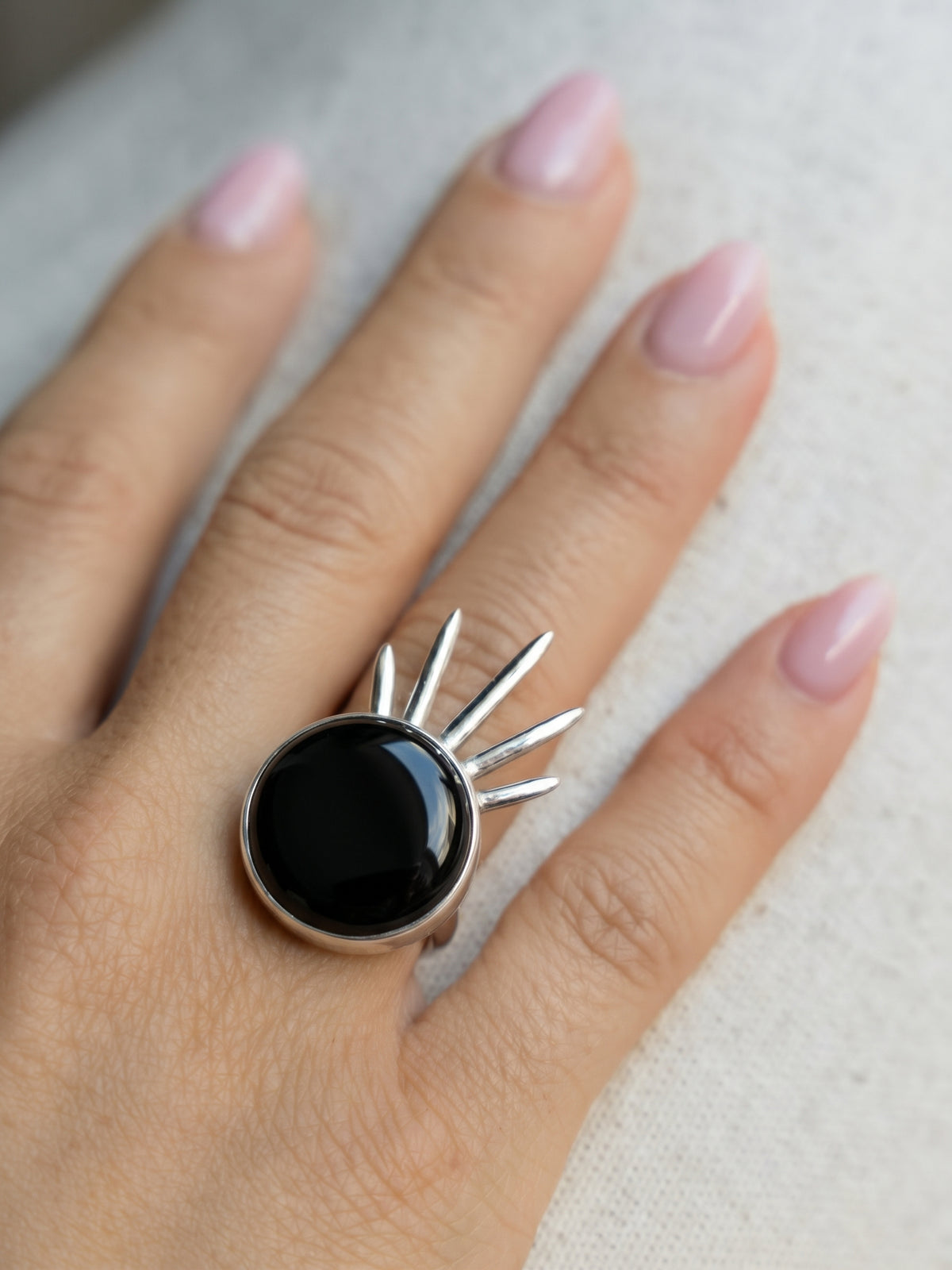 Sol Ring in sterling silver with black onyx, worn on the hand — handmade in Taxco, Mexico #Gemstone Type_Onyx