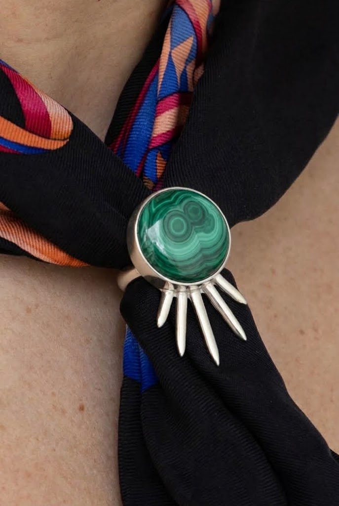 Sol Scarf Ring in sterling silver with malachite, on model — handmade in Taxco, Mexico #Gemstone Type_Malachite